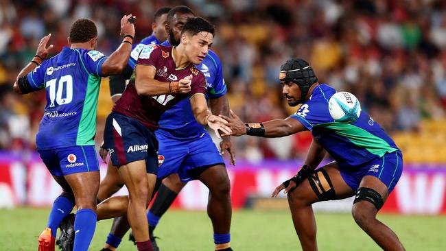 Kalani Thomas (centre) will get a chance to start for the Reds. Picture: Chris Hyde/Getty Images