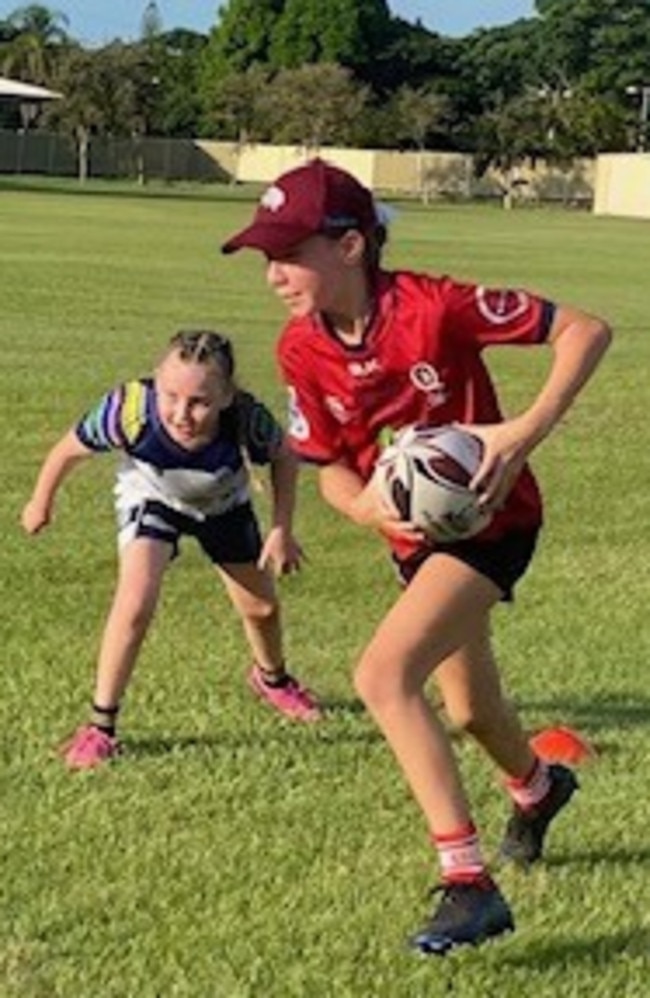 Rockhampton Brothers' Paislee Norton (left) and Colts' Tiffany Walker go through their paces at a Friday afternoon training session.