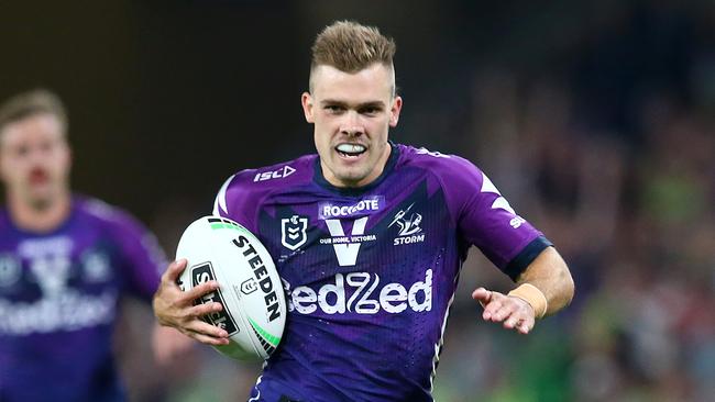 BRISBANE, AUSTRALIA - OCTOBER 16: Ryan Papenhuyzen of the Storm scores a try during the NRL Preliminary Final match between the Melbourne Storm and the Canberra Raiders at Suncorp Stadium on October 16, 2020 in Brisbane, Australia. (Photo by Jono Searle/Getty Images)