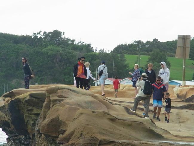 Terrigal Boardwalk: Large numbers of people on Terrigal headland on the weekend.