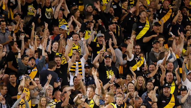 Tiger fans celebrate a goal against Carlton at the 2018 season-opener. Picture: Getty Images