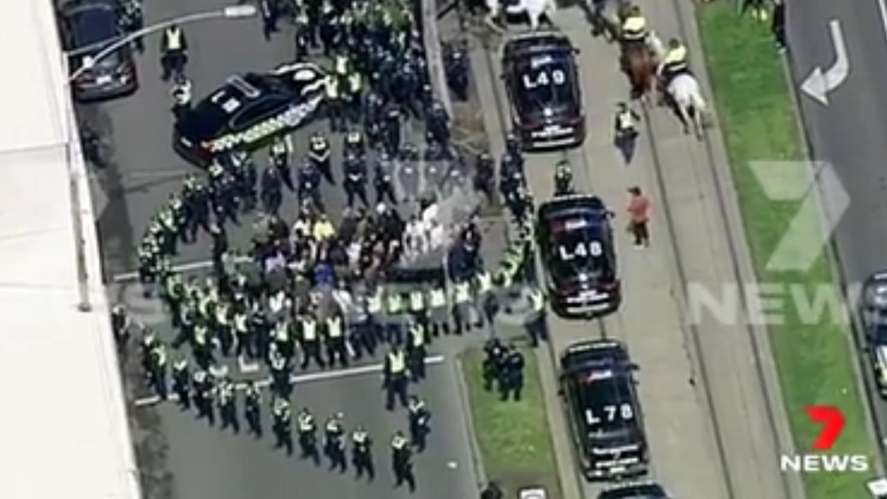 Police formed a circle around the protesters.