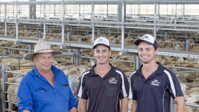 Michael and sons Angus and Jack Treweek from Bald Hills selling 102. Picture: Zoe Phillips