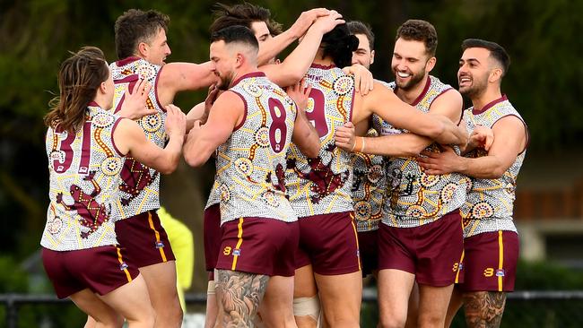 SFNL: Murrumbeena teammates congratulate Steve Tolongs after a goal. Picture: Josh Chadwick