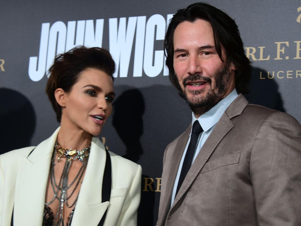 Keanu Reeves and Ruby Rose promote John Wick Chapter Two. Reeves says he would like to revisit the role of Neo from The Matrix. Picture: AFP Photo/Frederic J. Brown