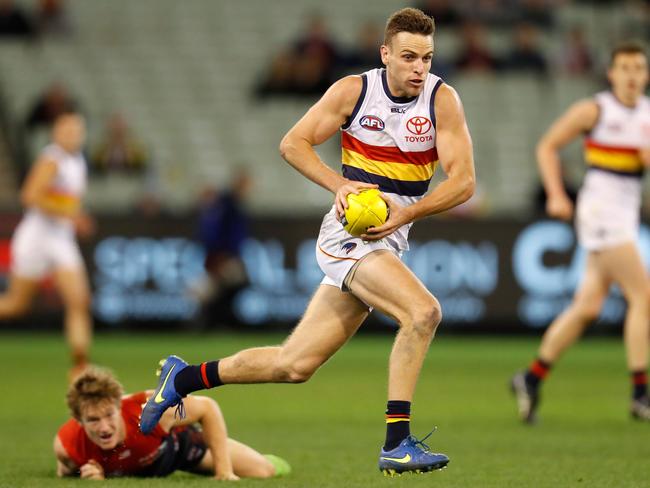 Brodie Smith clears the Crows from defence. (Photo by Michael Willson/AFL Media/Getty Images)