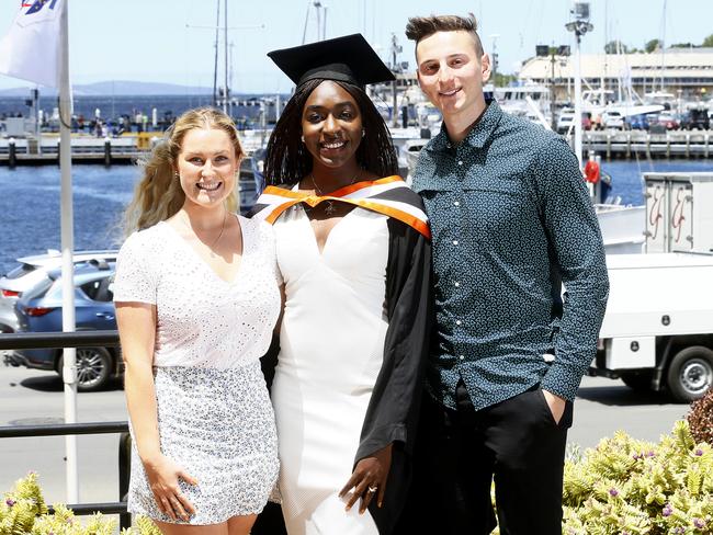 UTAS Graduations - Tasmanian School of Business and Economics and Graduate Research graduates are pictured before the ceremony. (L-R) Kate Coverdale, Loveth Ochayi, Johannes Peters. Picture: MATT THOMPSON