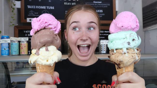 Scoop staff member Sarah Radler with some of the Burleigh stores award-winning product. Scoop Gelati were the last Best Ice Cream winners. The competition kicked off again on the 13th. Picture Glenn Hampson