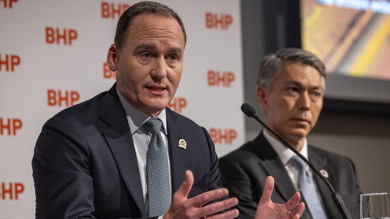 BHP Chairman Ken MacKenzie and CEO Mike Henry in Adelaide following the miner’s annual meeting on Wednesday. Picture: NCA Newswire/Emma Brasier