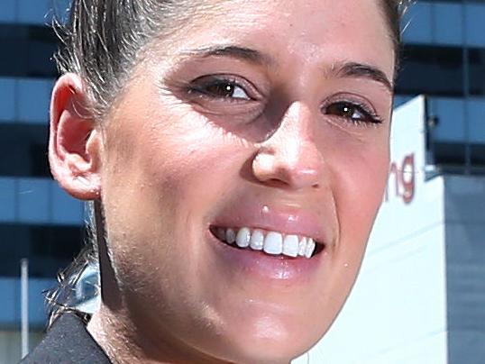 17/02/2016. Jada Parisi, currently works for a white collar company in Sydney but is about to relocate to Perth to pursue her ambitions. Photographed on Pyrmont Bridge, Darling Harbour in Sydney. Britta Campion / The Australian.