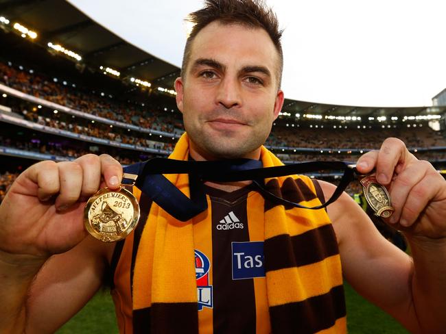 Lake with his Norm Smith medal and Premiership medal after the 2013 grand final. (Photo: Michael Willson/AFL Media)