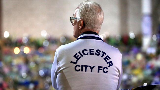 A mourner pauses to pay tribute at The King Power Stadium. Picture: Getty Images