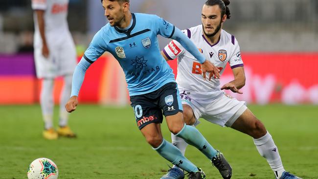 Milos Ninkovic, left, of Sydney FC and Nicholas Dagostino of Perth Glory during the round-23 A-League match on Saturday at Netstrata Jubilee Stadium in Sydney. Picture: Getty Images