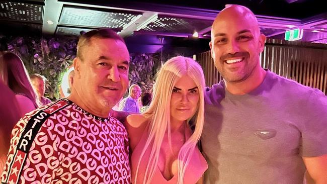 Jeff Fenech, with his partner Suzee and boxing trainer Fidel Tukel (right), is on the mend.