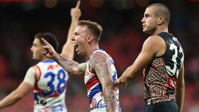 SYDNEY, AUSTRALIA - MAY 18: James Harmes of the Bulldogs celebrates kicking a goal during the round 10 AFL match between Greater Western Sydney Giants and Western Bulldogs at ENGIE Stadium, on May 18, 2024, in Sydney, Australia. (Photo by Cameron Spencer/Getty Images)