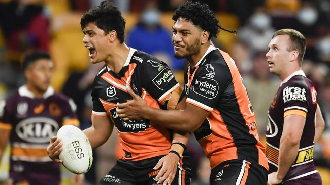 Tommy Talau celebrates a crucial late try (Photo by Albert Perez/Getty Images)