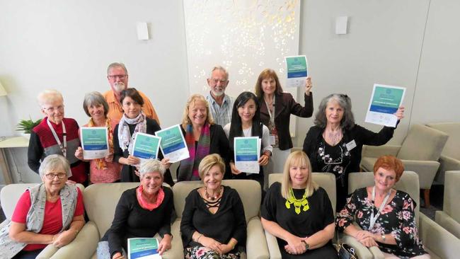 HERE'S TO YOU: Volunteers with their certificates of appreciation at a lunch from Arcare. Picture: Alan Lander