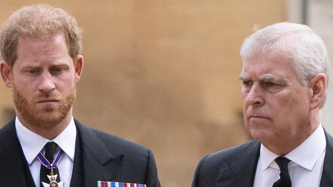 Britain's Prince Harry, Duke of Sussex (L) talks with Britain's Prince Andrew, Duke of York as they arrive at St George's Chapel inside Windsor Castle on September 19, 2022, ahead of the Committal Service for Britain's Queen Elizabeth II. - Monday's committal service is expected to be attended by at least 800 people, most of whom will not have been at the earlier State Funeral at Westminster Abbey. (Photo by David Rose / POOL / AFP)