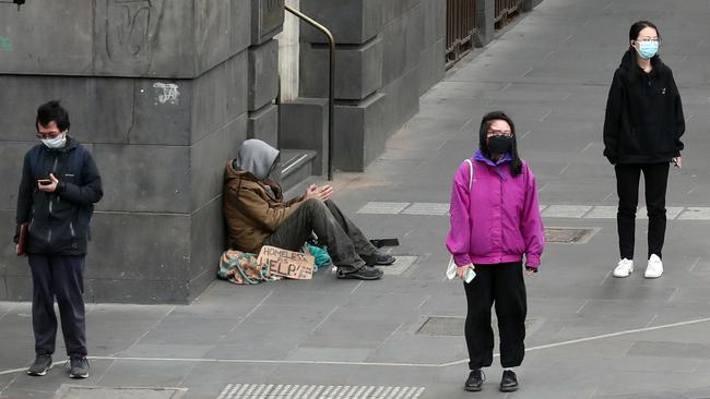 A homeless man in Bourke Street. Picture: NCA NewsWire/ David Crosling