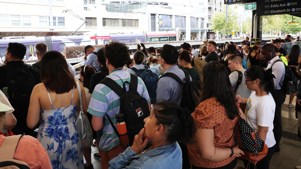 Crowds of passengers packed onto the platform waiting for delayed trains at Central Station this week. Photographer:Ted Lamb