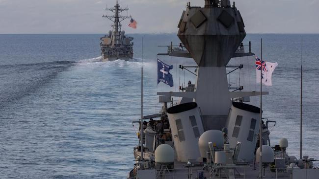 HMAS Ballarat sails with USS John S. McCain in the Strait of Malacca while sailing for Exercise Malabar. Picture: Leading Seaman Shane Cameron