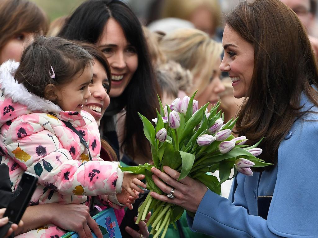 Britain's Catherine, Duchess of Cambridge greets wellwishers as she arrives in Ballymena, Northern Ireland. Picture: AFP