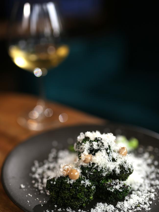 Broccolini with macadamia and black garlic from Peacock Den. Picture: Stuart Milligan