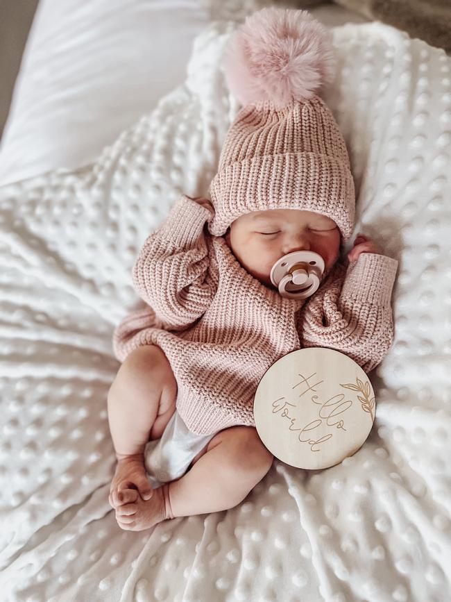Pippa Olivia, one week old. Our little angel loves to be decorated with stickers by her two year old brother.