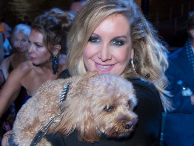 Barrister Gina Edwards and Oscar the cavoodle. Ms Edwards has launched defamation proceedings against A Current Affair over their reporting of a custody dispute involving Oscar. Picture: Supplied