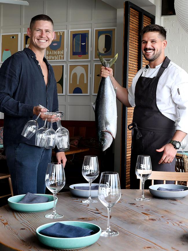 North Bondi Fish General Manager Jack James Steer and head chef Stefano Mondonico with a king fish as they prepare for re-opening on Sunday in eastern Sydney. Picture: Jane Dempster