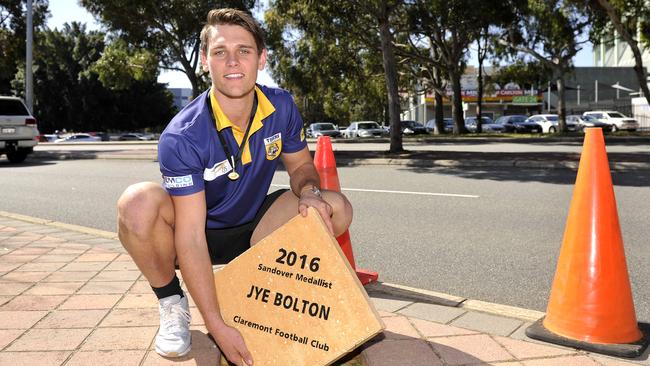 Sandover Medal winner doing the traditional pavement placing outside Subiaco Oval. Claremont's Jye Bolton was awarded the medal last night.