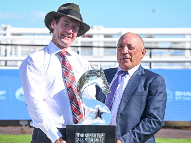 Ciaron Maher with Tony Ottobre after Pride Of Jenni won the The Sharp EIT All-Star Mile at Caulfield Racecourse on March 16, 2024 in Caulfield, Australia. (Photo by Reg Ryan/Racing Photos via Getty Images)