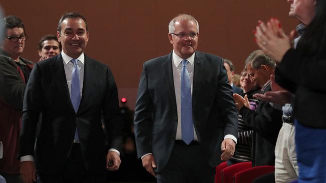 Prime Minister Scott Morrison and South Australian Premier Steven Marshall arrive at the South Australian Liberal party Annual General Meeting at the Adelaide Convention Centre in August. Picture: AAP Image/Kelly Barnes