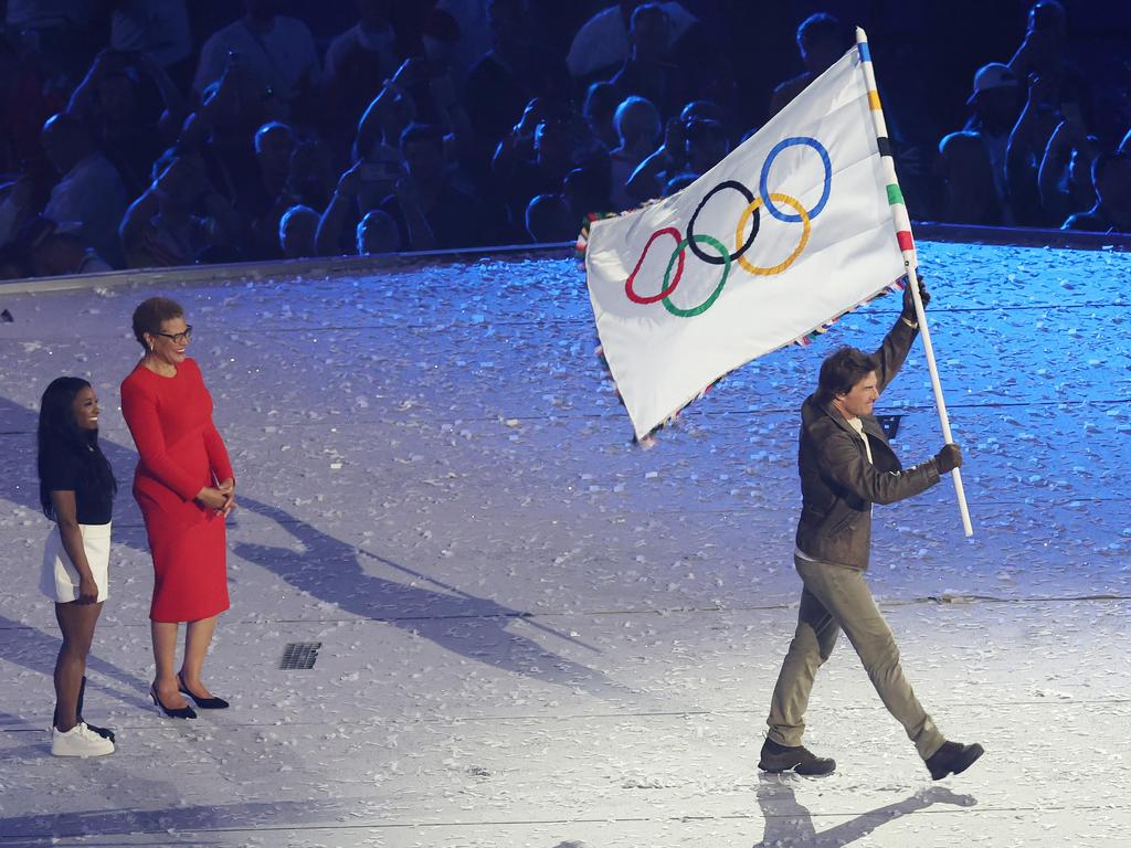 Tom Cruise carries the Olympic flag at the Paris closing ceremony on August 11, 2024. Picture: Adam Head