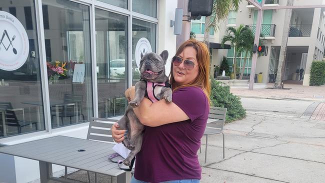 Monica Muhart with her dog. Picture: Adam Creighton