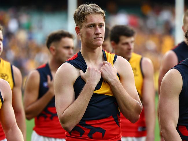 MELBOURNE, AUSTRALIA - JUNE 01: Brayden Cook and his Crows' team mates look dejected after losing the round 12 AFL match between Hawthorn Hawks and Adelaide Crows at Melbourne Cricket Ground, on June 01, 2024, in Melbourne, Australia. (Photo by Quinn Rooney/Getty Images)