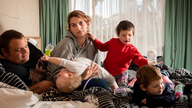 Tarnie Edwards with husband Robbie and children Sienna, 3, Isabella, 2, and Sandra, 1, at their temporary accommodation in Doveton. Picture: Penny Stephens