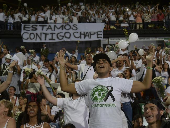 People participate in a tribute to the footballers of Brazilian team Chapecoense Real. Picture: Raul Arboleda.