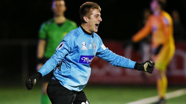 Moreland Zebras goalkeeper Jack West-Astuti celebrates a save.