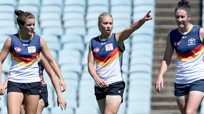 Erin Phillips, centre, offers leadership as the Crows women play a scratch match at Football Park. Picture: Naomi Jellicoe