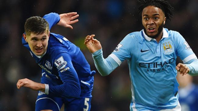 MANCHESTER, ENGLAND - JANUARY 13: Raheem Sterling of Manchester City and John Stones of Everton compete for the ball during the Barclays Premier League match between Manchester City and Everton at the Etihad Stadium on January 13, 2016 in Manchester, England. (Photo by Laurence Griffiths/Getty Images)