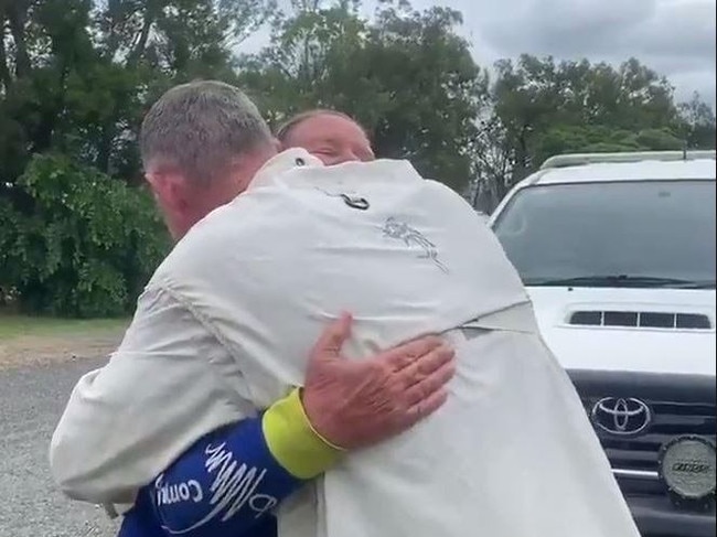 The moment the hiker is reunited with her husband. Picture: Hope Wilson/7 News Brisbane/Twitter