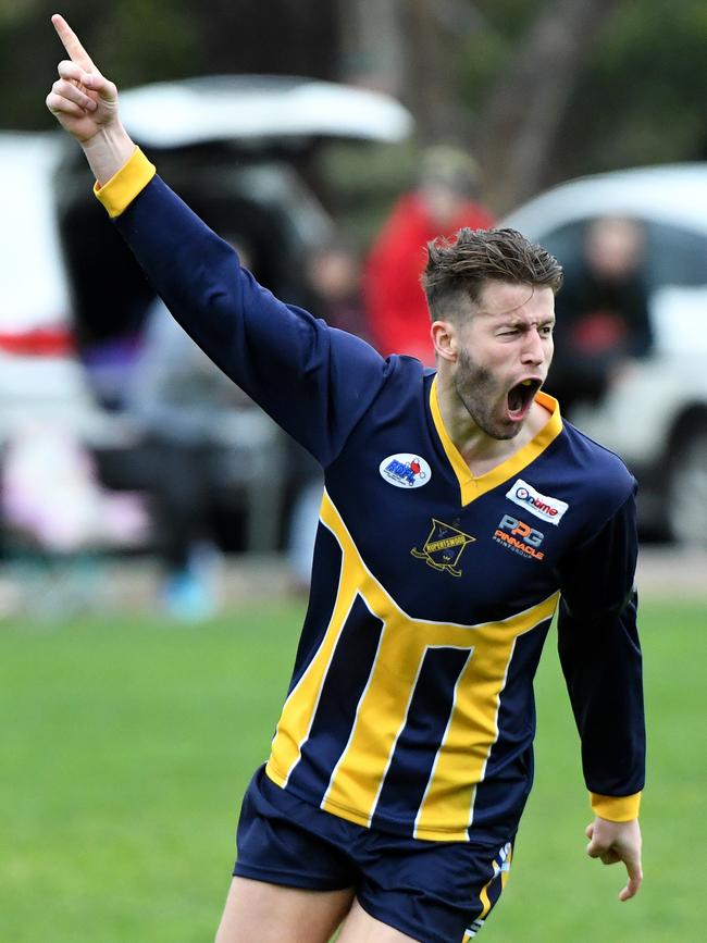 Cam McRorie celebrates a goal for Rupertswood.