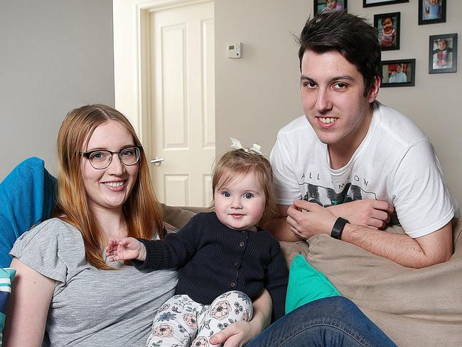 Sophie Dimond, 21, and Aaron Leckie, 21, with their daughter Violet, 15 months, rent in Melton West. Picture: Ian Currie.