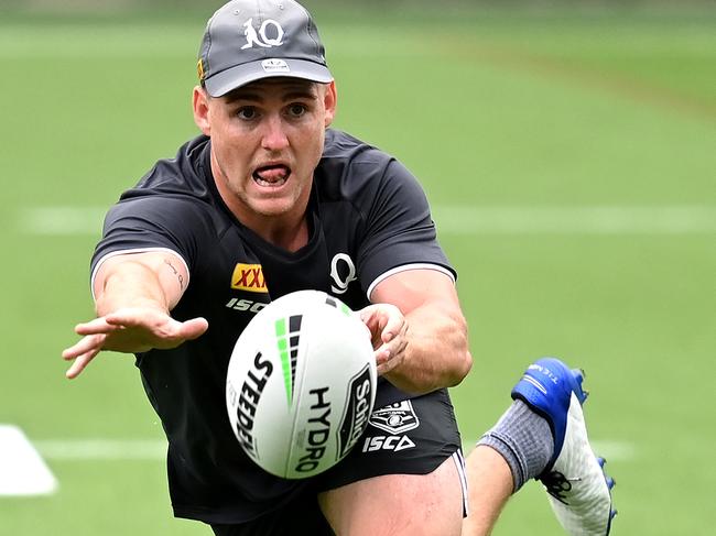 GOLD COAST, AUSTRALIA - OCTOBER 27: AJ Brimson passes the ball during a Queensland Maroons State of Origin training session at Cbus Super Stadium on October 27, 2020 in Gold Coast, Australia. (Photo by Bradley Kanaris/Getty Images)