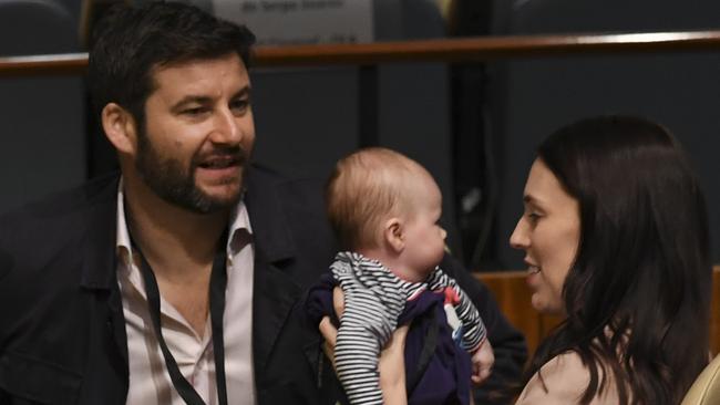 Jacinda Ardern holds baby daughter Neve Te Aroha Ardern Gayford, as her husband Clarke Gayford looks on during the Nelson Mandela Peace Summit. Picture: Don Emmert/AFP