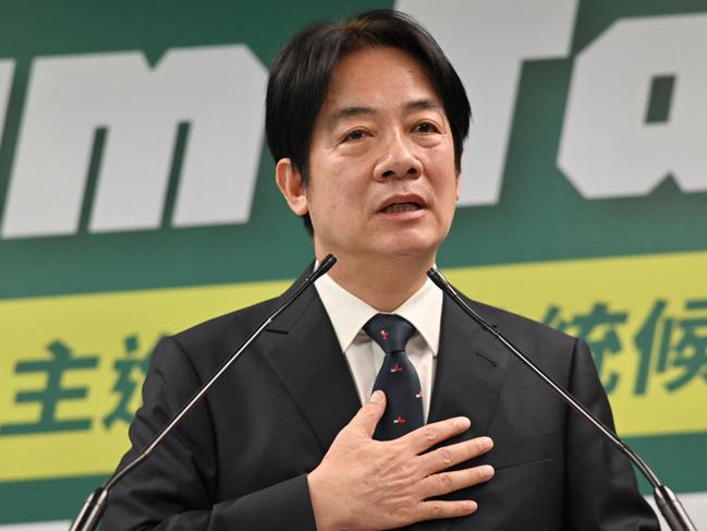 (FILES) Taiwan Vice President and Chairman of ruling Democratic Progressive Party (DPP) William Lai gestures during his speech at the DPP headquarters in Taipei on April 12, 2023. Lai flies to the United States on August 12, 2023 in a sensitive trip that has angered Chinese officials. Lai, a candidate for Taiwan's presidential elections next year, is officially making only transit stops in the United States en route to and from Paraguay, where he will be attending the inauguration. (Photo by Sam Yeh / AFP)