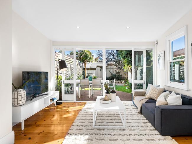 The open plan family and kitchen area flows out to the backyard.