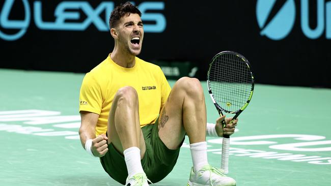 Thanasi Kokkinakis of Team Australia celebrates after winning his singles match against Ben Shelton. Photo by Matt McNulty/Getty Images for ITF.