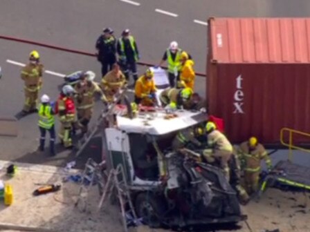 Motorists are being urged to avoid the busy road after three vehicles, including two trucks, collided in Melbourne.